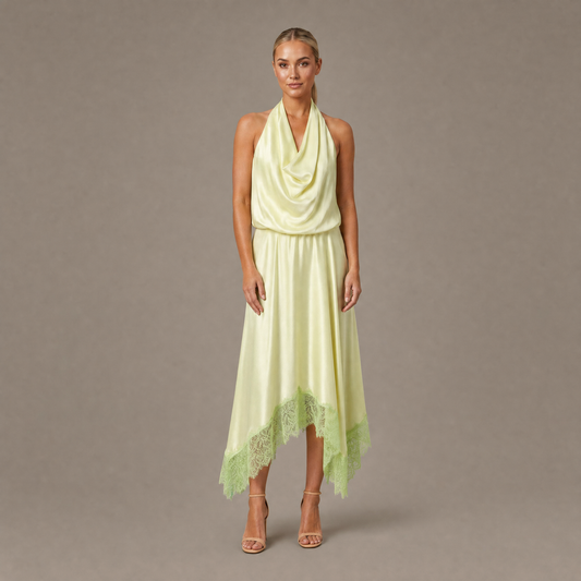 Woman wearing the key lime backless halter silk maxi dress, front view