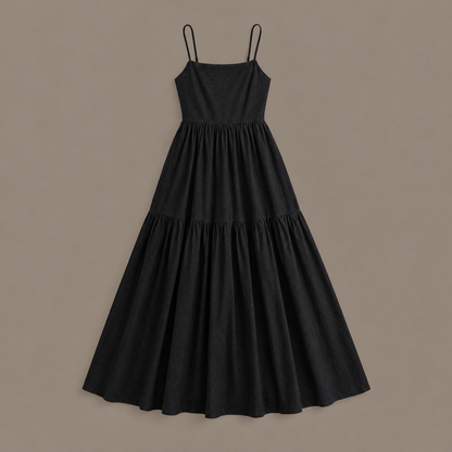 The black tiered maxi dress photographed on its own