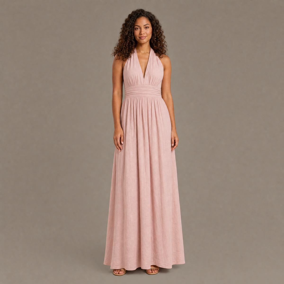 Woman wearing the pink boho cotton linen halter maxi dress, front view