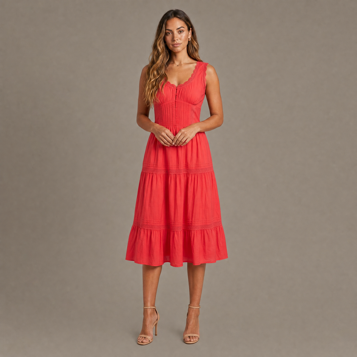 Woman wearing the red embroidered corset effect midi dress, front view