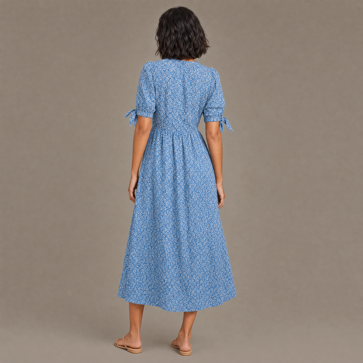 Back view of the blue flowing print summer dress