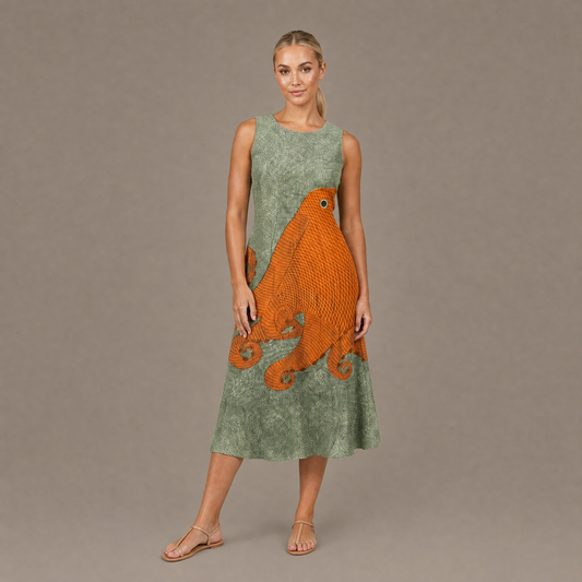 Woman wearing the green octopus print cotton sundress, front view