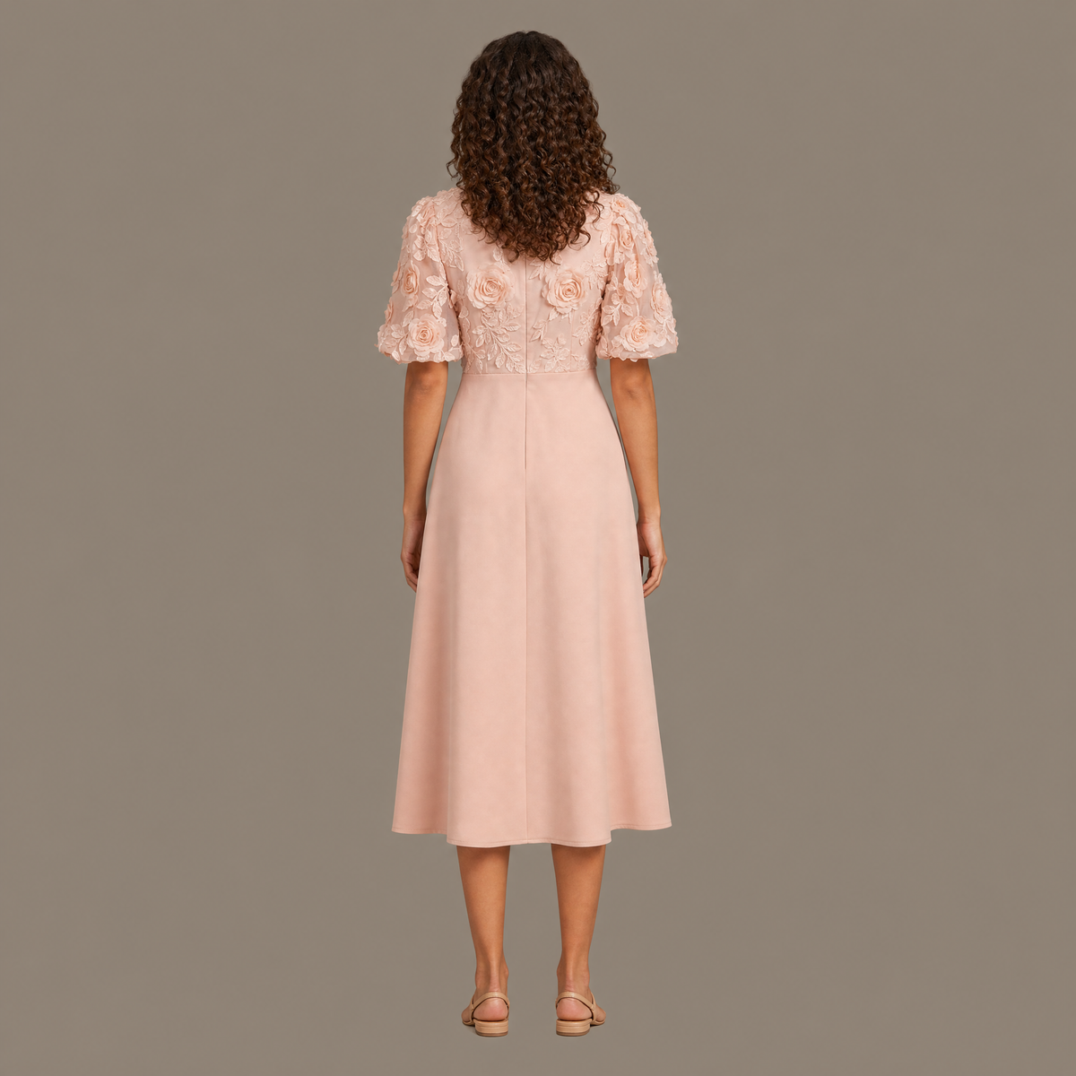 Back view of the peach pink puff sleeve floral midi dress