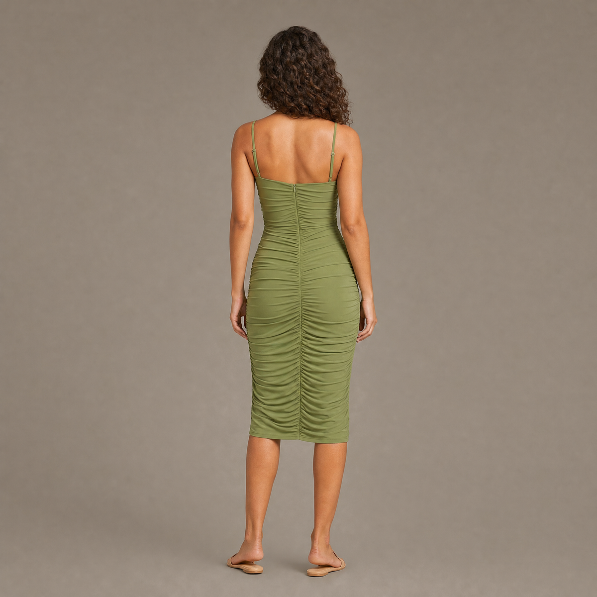 Back view of the green ruched bodycon dress