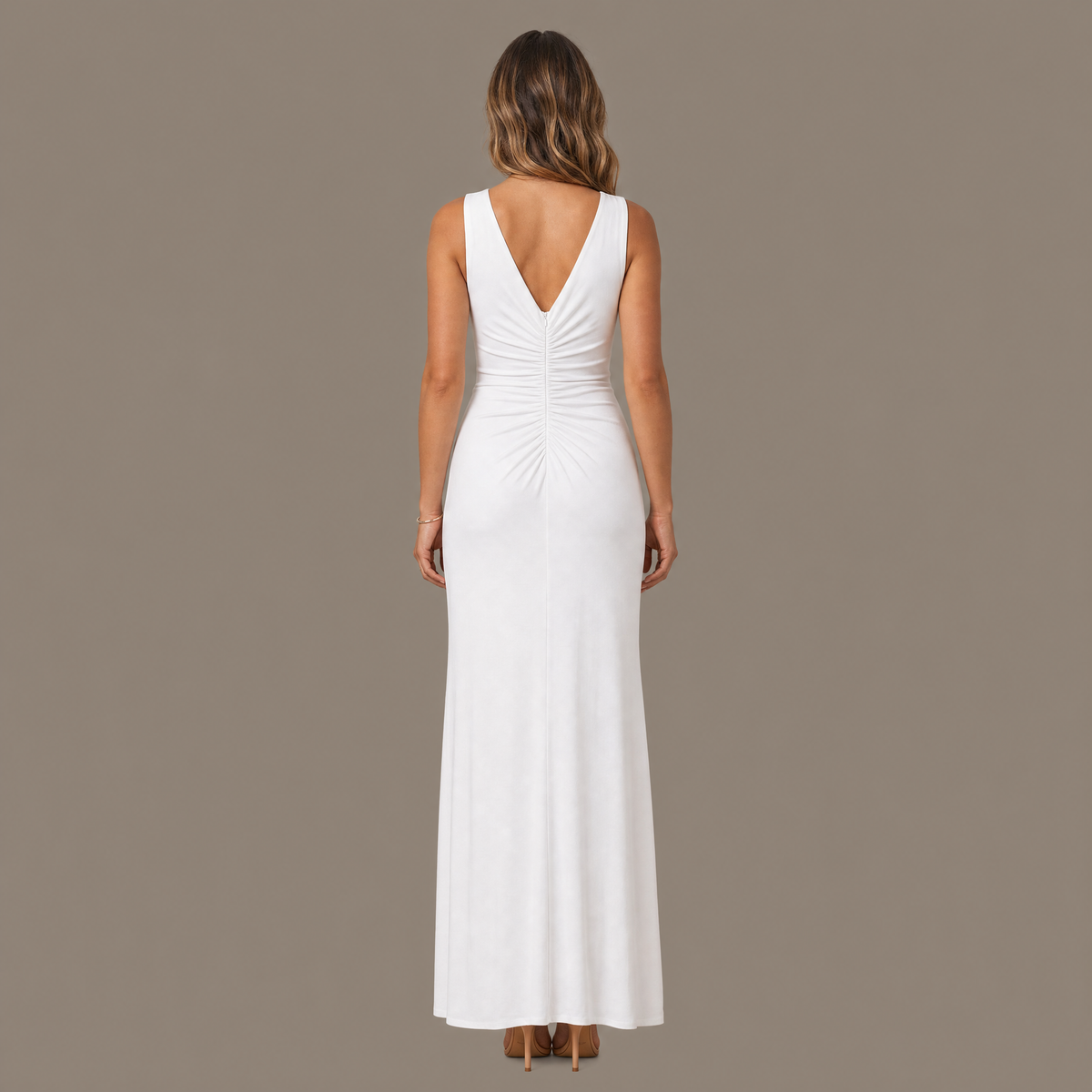Back view of the white ruched V neck maxi dress