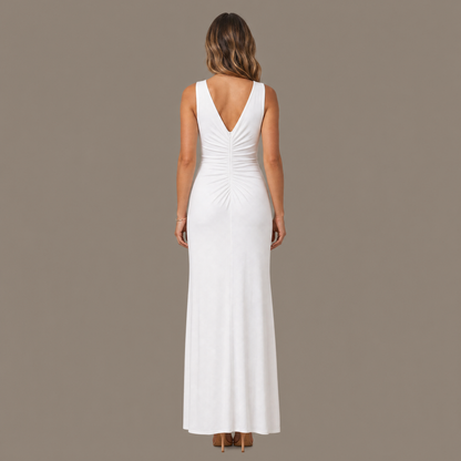 Back view of the white ruched V neck maxi dress