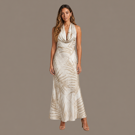 Woman wearing the natural tropical print satin maxi dress, front view