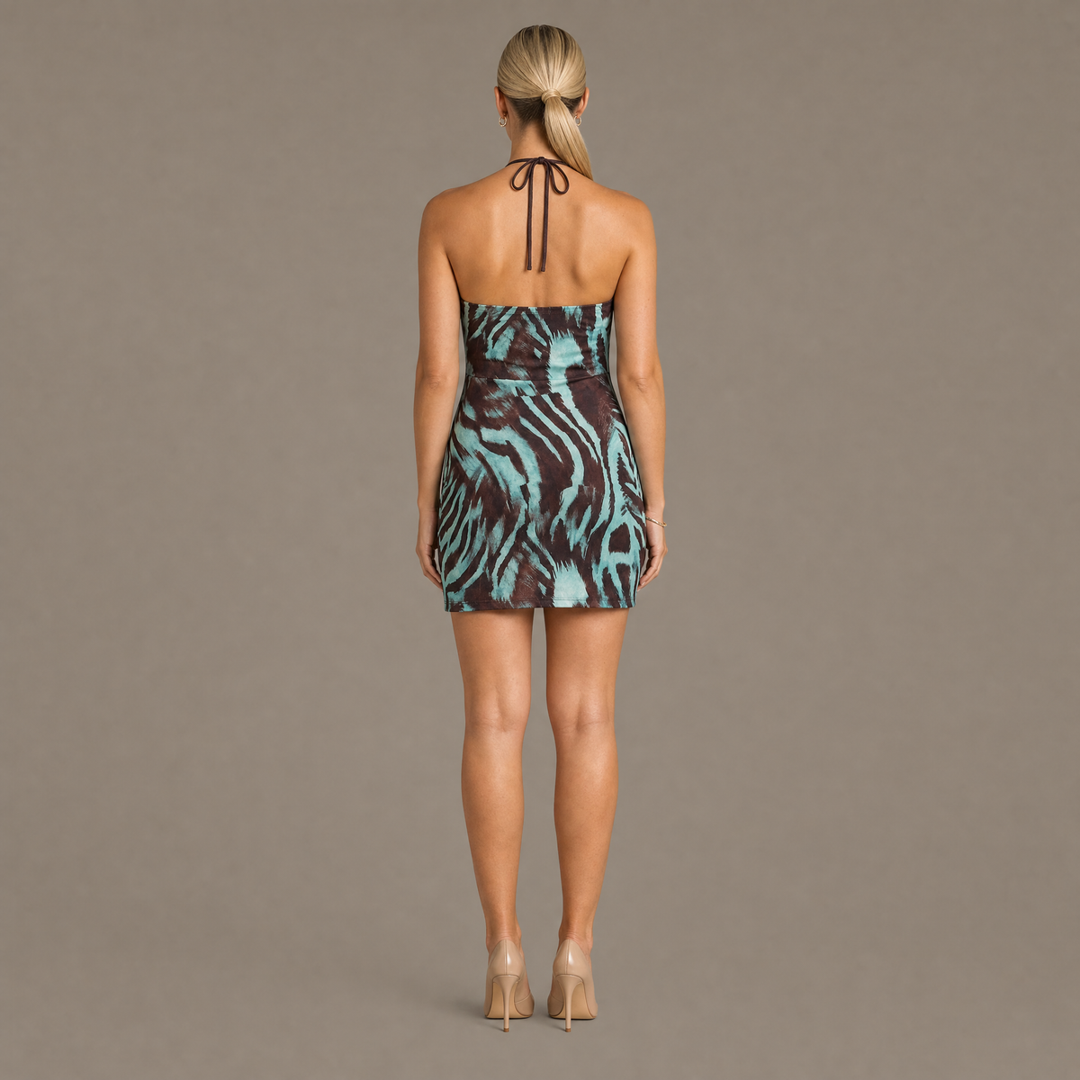 Back view of the brown zebra print halter bodycon dress